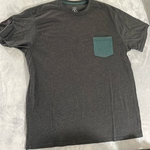 Volcom pocket t shirt   Great condition size xl.  Heather Grey w/ green pocket